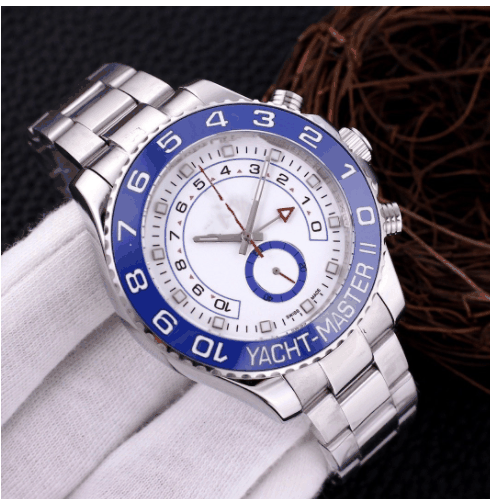 Business men's mechanical watch with silver metal band and blue bezel displaying calendar and pointer style dial