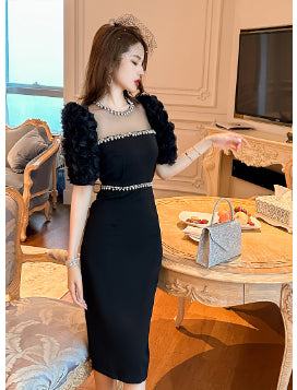 Black round neck beaded slim fit dress with puff sleeves and midi length