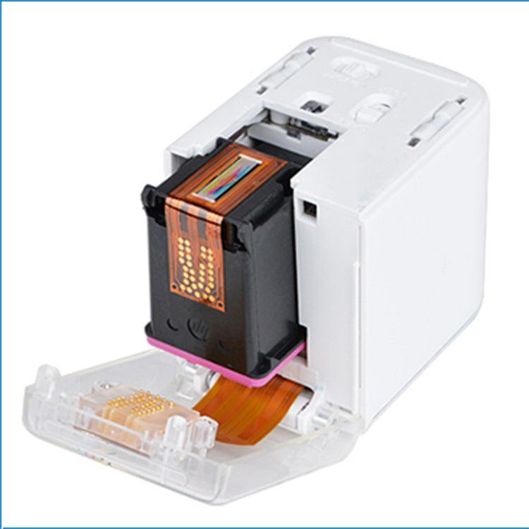 Portable Mbrush Color handheld inkjet printer with open cartridge slot and compact design