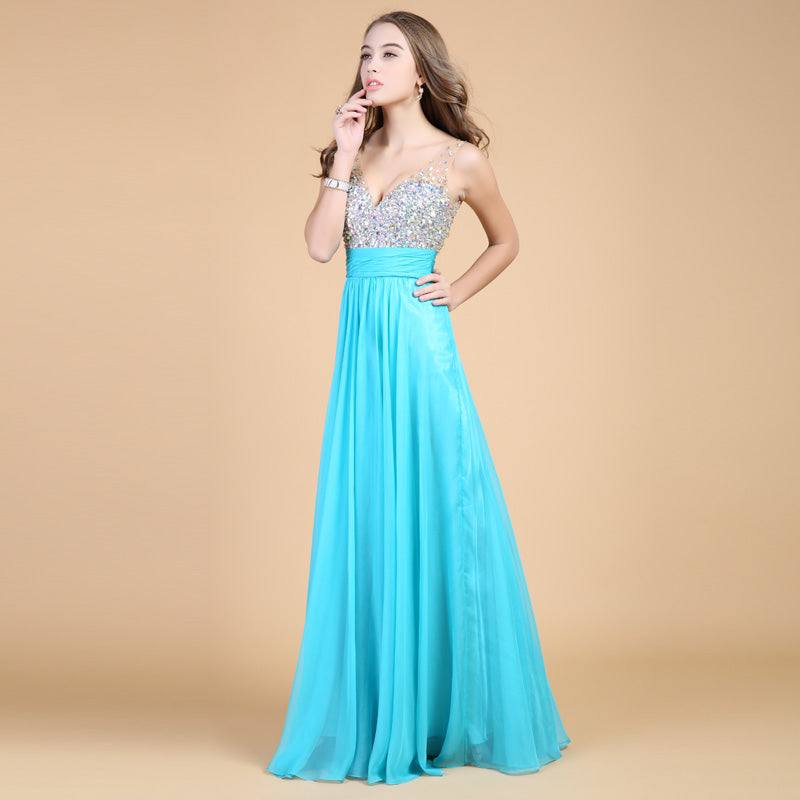 Elegant turquoise evening dress with deep V-neck, Austrian diamond bodice, and long chiffon skirt for weddings and formal events