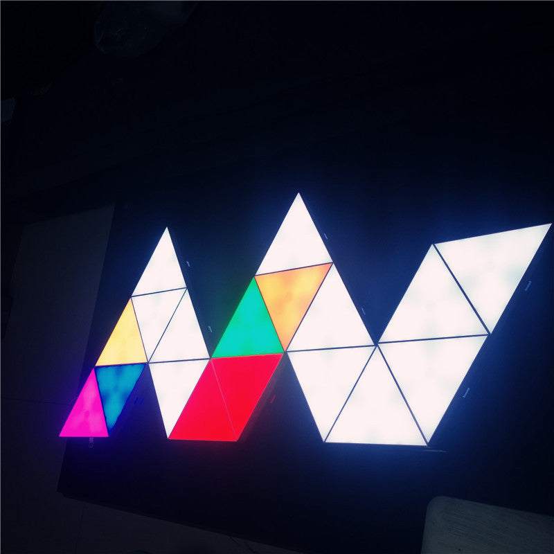RGB Triangle Modular Lights arranged in a customizable wall pattern with app control and bright white color panels