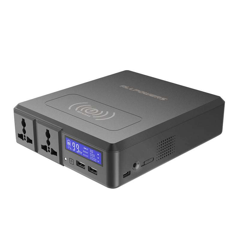 Portable notebook power bank with 220V output, multiple sockets, USB ports, digital display, and wireless charging feature.