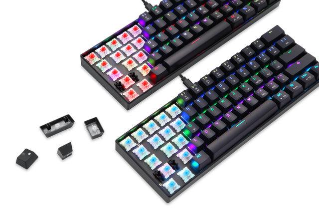 RGB backlit mechanical keyboard with removable keycaps and colorful switches displayed on white background