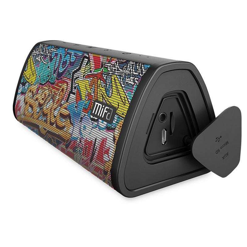 Waterproof outdoor speaker with colorful graffiti design, Bluetooth connection, subwoofer stereo, built-in lithium battery, and compact plastic shell.