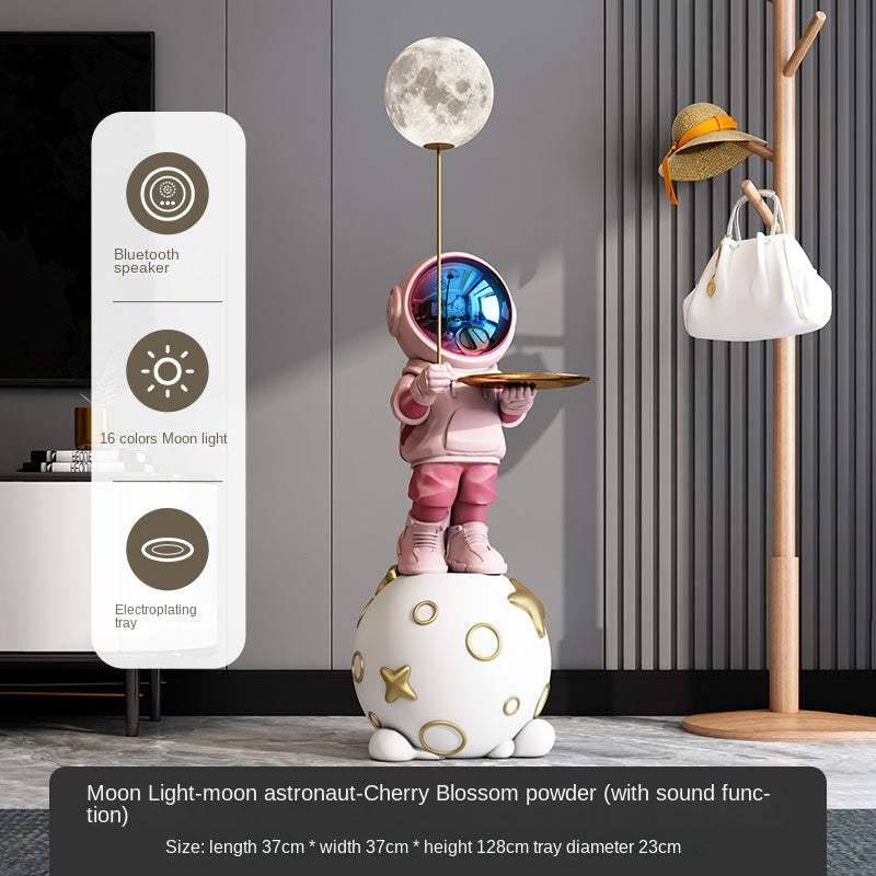 Modern astronaut living room floor decoration with moon light, electroplating tray, and Bluetooth speaker in pink color