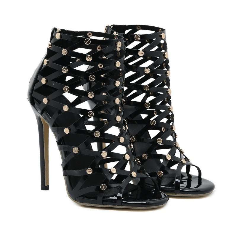 Black women's fashion hollowed-out sandal boots with high stiletto heels and ankle-strap buckle closures.
