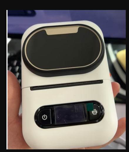 Handheld wireless Bluetooth portable thermal printer in white with compact design and display screen
