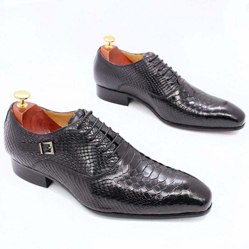 Black business formal leather shoes for men with textured reptile pattern and lace-up design