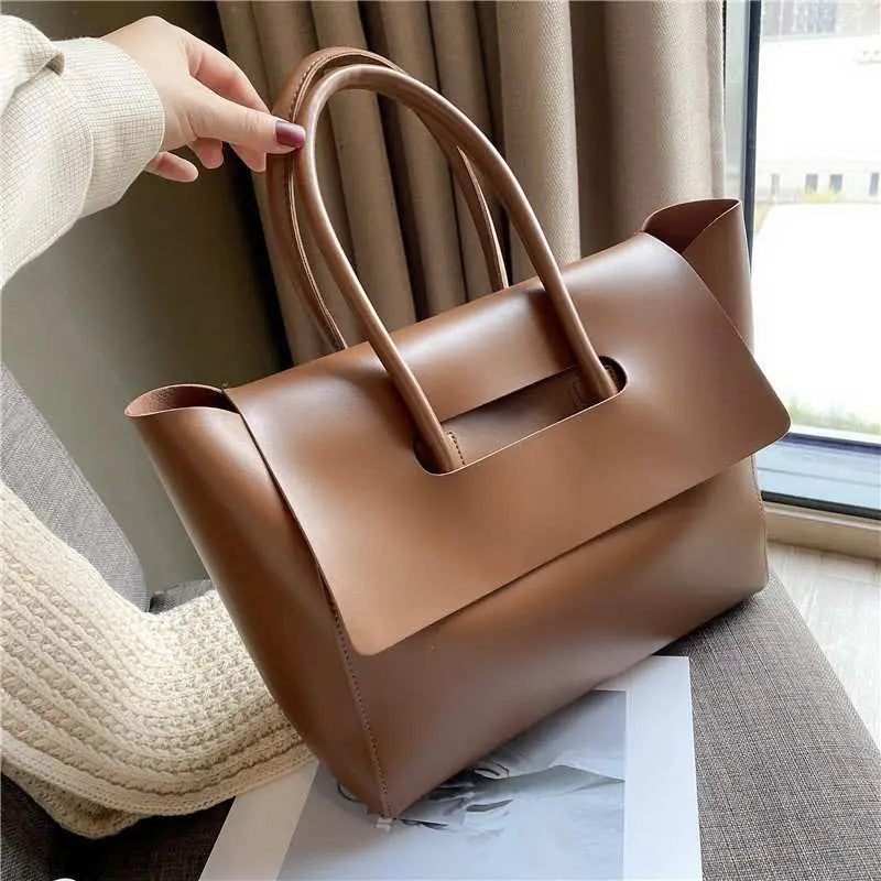Fashion Women Shoulder Bags Large Capacity Handbags Simple Retro Tote Overview:Unique design, stylish and beautiful.Good material, High quality.100% Brand New.A variety of colors, any choice.Product information:Lining texture: PolyesteDropshipmanAMIR BAGS INDIA PRIVATE LIMITEDnull