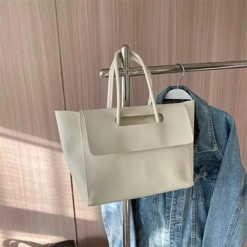 Fashion Women Shoulder Bags Large Capacity Handbags Simple Retro Tote Overview:Unique design, stylish and beautiful.Good material, High quality.100% Brand New.A variety of colors, any choice.Product information:Lining texture: PolyesteDropshipmanAMIR BAGS INDIA PRIVATE LIMITEDnull