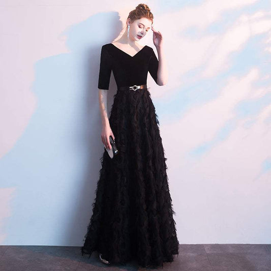 Elegant black evening dress for women with V-neck, five-point sleeves, fitted waist, and textured long skirt