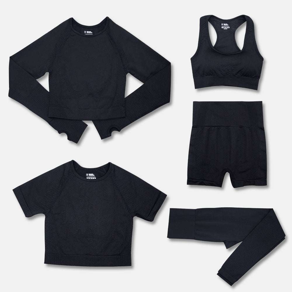 Fashion women's workout yoga clothes set in black including long sleeve top, sports bra, short sleeve top, shorts, and leggings.