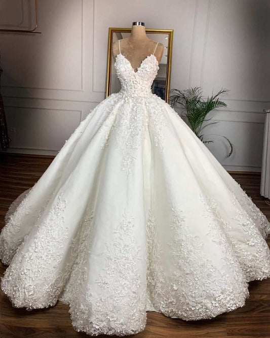 Deep V-neck white lace floor-length wedding dress with sleeveless straps and embroidered floral details