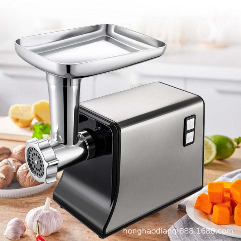 Silver and black electric meat grinder with double mixing blade and aluminum alloy tray on kitchen counter