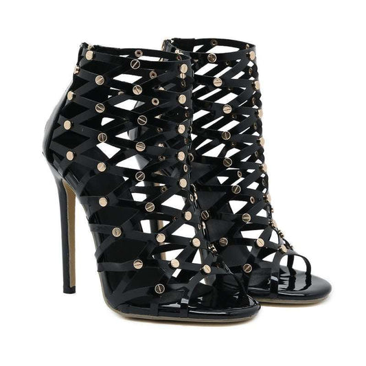Black women's fashion hollowed-out sandal boots with high stiletto heels and ankle-strap buckle closures.