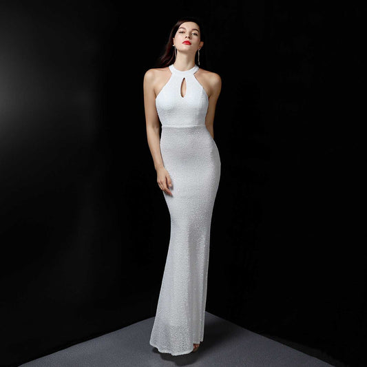 Slim white evening dress with halter neck and keyhole detail, fitted silhouette for a slimming effect
