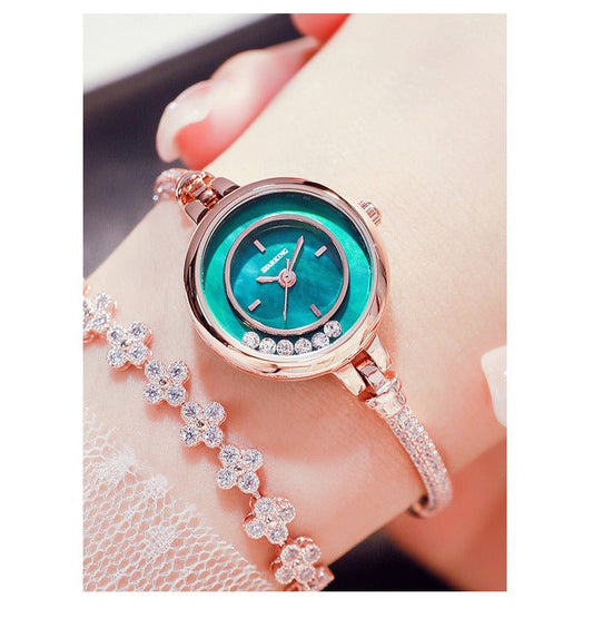 Small green dial women's elegant circular quartz watch with rose gold strap and decorative crystals