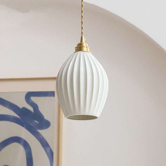White ceramic bedside lamp with ribbed shade and brass fixture hanging light for bedroom bedside brass lighting fixtures