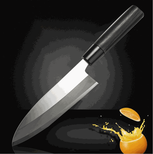 Kitchen stainless steel multi-purpose kitchen knife with chestnut handle cutting an orange on black background