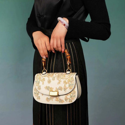 Cowhide Embroidery Ladies Bamboo Handbag - AMIR BAGS INDIA PRIVATE LIMITED