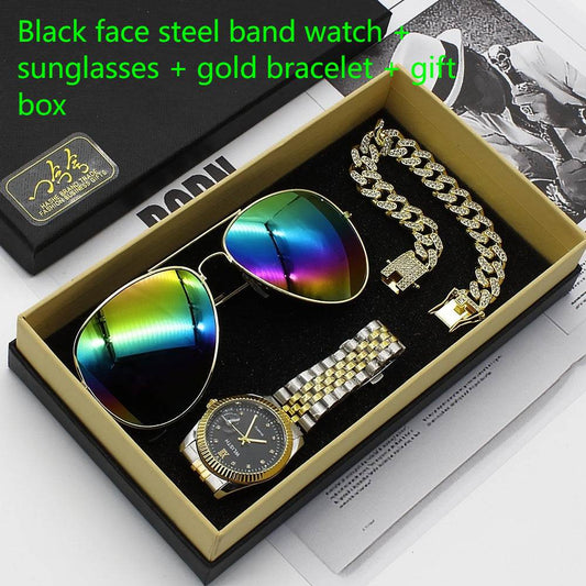 Black face steel wristwatch with gold bracelet, aviator sunglasses, and gold chain in gift box