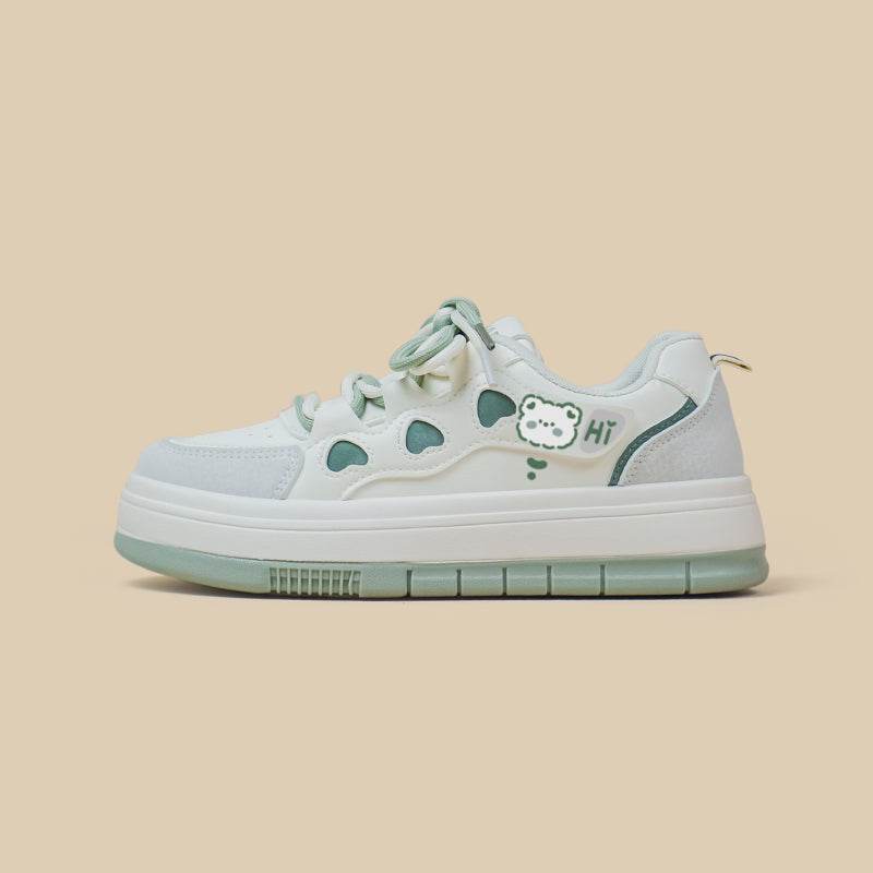 White and green women's sports and leisure sneakers with flat rubber sole and round toe design