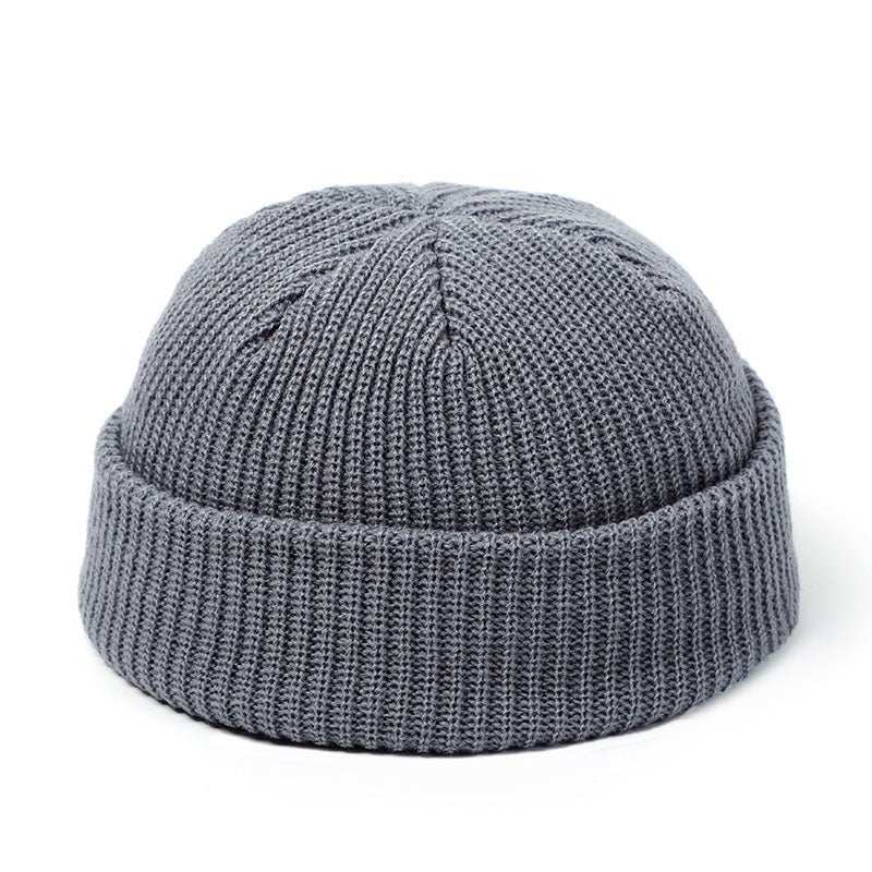 Knitted wool hat - AMIR BAGS INDIA PRIVATE LIMITED